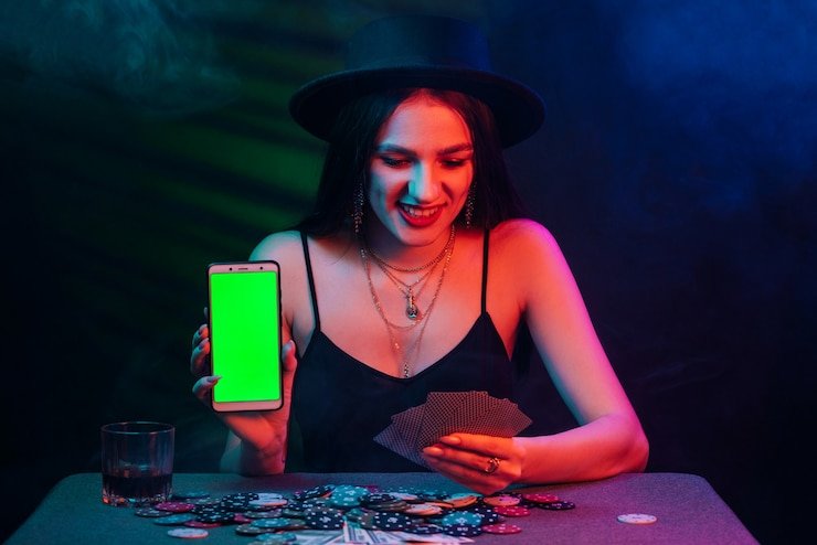 Live baccarat table on link royaltoto app showing the 'Reconnecting.' status banner